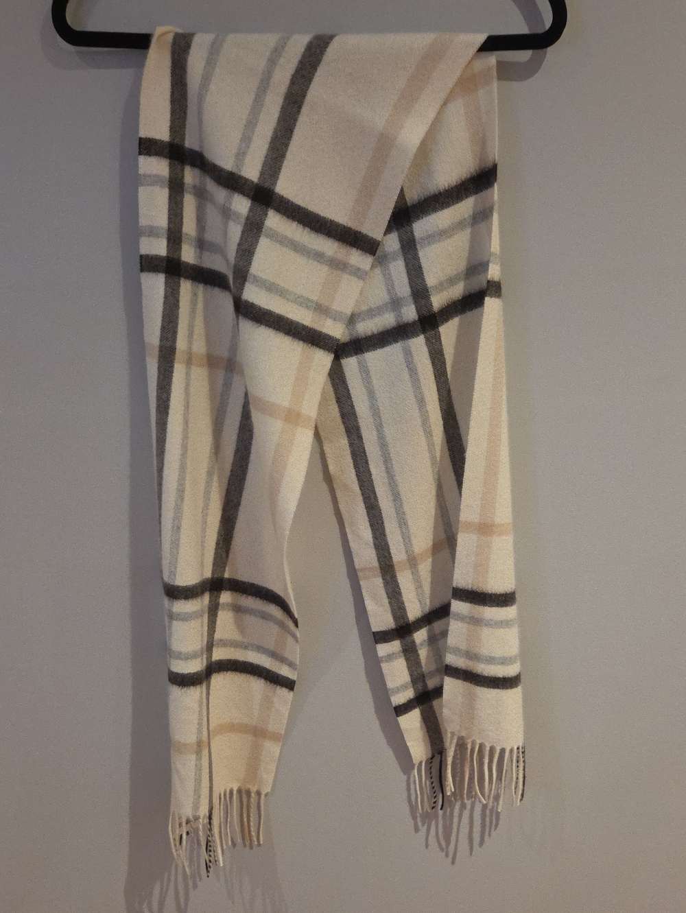 Label shows 100% cashmere; likely a cape or scarf-like coat